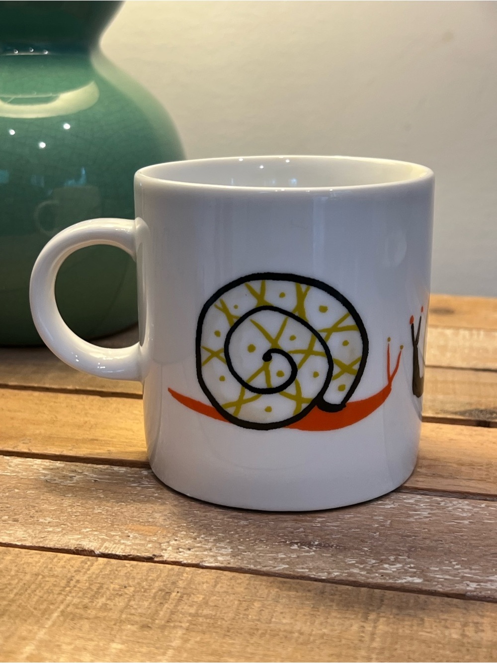 White Ceramic Mug with Snail Designs